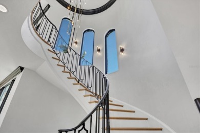 A luxurious coastal retreat at the water's edge on Longboat Key on Links on Longboat Golf Club in Florida - for sale on GolfHomes.com, golf home, golf lot