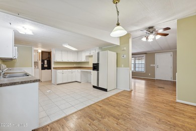 *PRICE REDUCED* This well-maintained home, with a fenced-in on Oyster Bay Golf Links in North Carolina - for sale on GolfHomes.com, golf home, golf lot