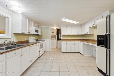 *PRICE REDUCED* This well-maintained home, with a fenced-in on Oyster Bay Golf Links in North Carolina - for sale on GolfHomes.com, golf home, golf lot