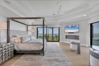 A luxurious coastal retreat at the water's edge on Longboat Key on Links on Longboat Golf Club in Florida - for sale on GolfHomes.com, golf home, golf lot