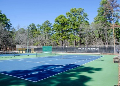 Elegance meets country charm in this completely remodeled home on Holly Lake Ranch Golf Club in Texas - for sale on GolfHomes.com, golf home, golf lot