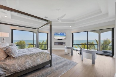 A luxurious coastal retreat at the water's edge on Longboat Key on Links on Longboat Golf Club in Florida - for sale on GolfHomes.com, golf home, golf lot