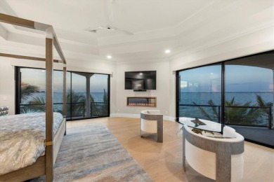 A luxurious coastal retreat at the water's edge on Longboat Key on Links on Longboat Golf Club in Florida - for sale on GolfHomes.com, golf home, golf lot