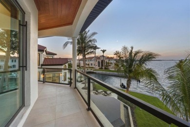 A luxurious coastal retreat at the water's edge on Longboat Key on Links on Longboat Golf Club in Florida - for sale on GolfHomes.com, golf home, golf lot