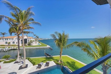 A luxurious coastal retreat at the water's edge on Longboat Key on Links on Longboat Golf Club in Florida - for sale on GolfHomes.com, golf home, golf lot