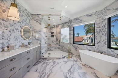 A luxurious coastal retreat at the water's edge on Longboat Key on Links on Longboat Golf Club in Florida - for sale on GolfHomes.com, golf home, golf lot