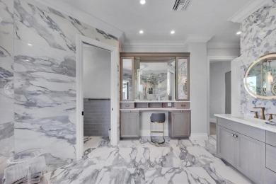 A luxurious coastal retreat at the water's edge on Longboat Key on Links on Longboat Golf Club in Florida - for sale on GolfHomes.com, golf home, golf lot