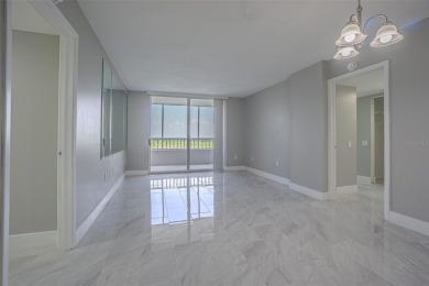 Welcome to this attractive remodeled condo with 2 split bedrooms on Feather Sound Country Club in Florida - for sale on GolfHomes.com, golf home, golf lot