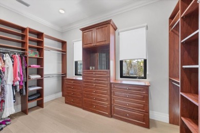 A luxurious coastal retreat at the water's edge on Longboat Key on Links on Longboat Golf Club in Florida - for sale on GolfHomes.com, golf home, golf lot