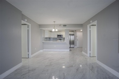 Welcome to this attractive remodeled condo with 2 split bedrooms on Feather Sound Country Club in Florida - for sale on GolfHomes.com, golf home, golf lot