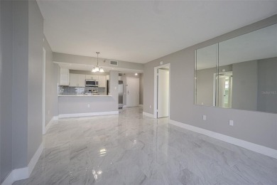 Welcome to this attractive remodeled condo with 2 split bedrooms on Feather Sound Country Club in Florida - for sale on GolfHomes.com, golf home, golf lot