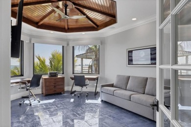A luxurious coastal retreat at the water's edge on Longboat Key on Links on Longboat Golf Club in Florida - for sale on GolfHomes.com, golf home, golf lot