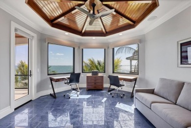 A luxurious coastal retreat at the water's edge on Longboat Key on Links on Longboat Golf Club in Florida - for sale on GolfHomes.com, golf home, golf lot