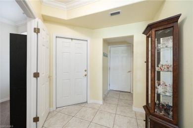 Nestled within the prestigious Colonial Golf  Country Club, this on Colonial Country Club in Florida - for sale on GolfHomes.com, golf home, golf lot