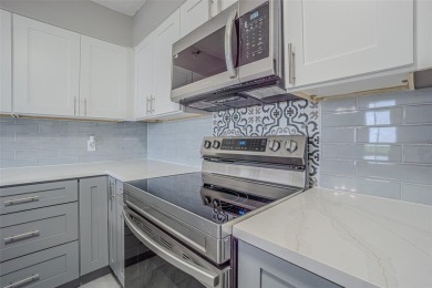 Welcome to this attractive remodeled condo with 2 split bedrooms on Feather Sound Country Club in Florida - for sale on GolfHomes.com, golf home, golf lot