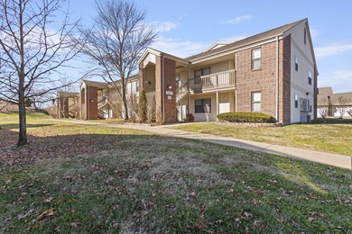 Discover refined living at its best in this pristine corner-unit on Pointe Royale Village Country Club in Missouri - for sale on GolfHomes.com, golf home, golf lot