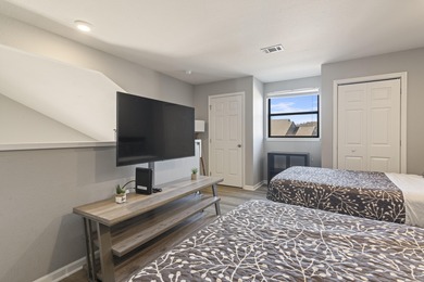 Discover refined living at its best in this pristine corner-unit on Pointe Royale Village Country Club in Missouri - for sale on GolfHomes.com, golf home, golf lot