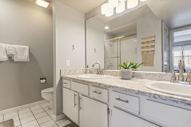 Discover refined living at its best in this pristine corner-unit on Pointe Royale Village Country Club in Missouri - for sale on GolfHomes.com, golf home, golf lot