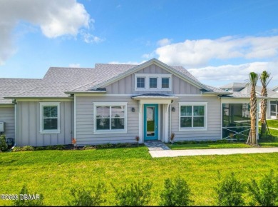 This gorgeous Aloha Cottage is priced to sell with income on LPGA International Golf Course in Florida - for sale on GolfHomes.com, golf home, golf lot