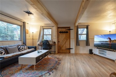 Embrace nature's beauty in this authentic log cabin, boasting on Big Bear Mountain Ski and Golf Resort in California - for sale on GolfHomes.com, golf home, golf lot