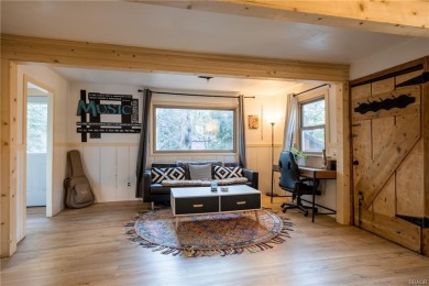 Embrace nature's beauty in this authentic log cabin, boasting on Big Bear Mountain Ski and Golf Resort in California - for sale on GolfHomes.com, golf home, golf lot