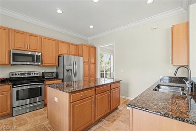 Don't miss this stunning Cayman Model home at friendly Colonial on Colonial Country Club in Florida - for sale on GolfHomes.com, golf home, golf lot