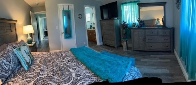 Discover refined living in Leisureville, Boynton Beach's premier on Leisureville Community Golf Course in Florida - for sale on GolfHomes.com, golf home, golf lot