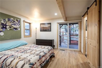 Embrace nature's beauty in this authentic log cabin, boasting on Big Bear Mountain Ski and Golf Resort in California - for sale on GolfHomes.com, golf home, golf lot