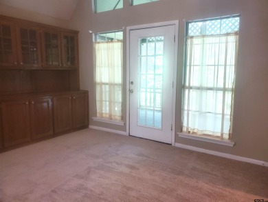 Beautiful chalet style home with Personality plus nestled on two on Holly Lake Ranch Golf Club in Texas - for sale on GolfHomes.com, golf home, golf lot