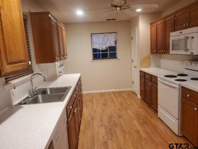 Beautiful chalet style home with Personality plus nestled on two on Holly Lake Ranch Golf Club in Texas - for sale on GolfHomes.com, golf home, golf lot