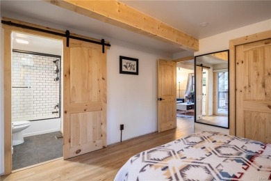Embrace nature's beauty in this authentic log cabin, boasting on Big Bear Mountain Ski and Golf Resort in California - for sale on GolfHomes.com, golf home, golf lot
