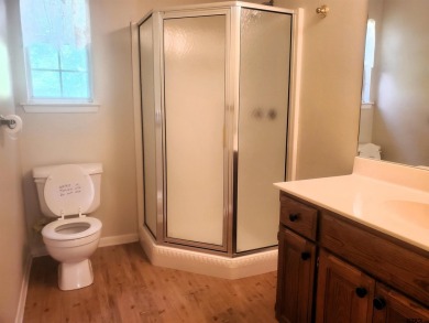 Beautiful chalet style home with Personality plus nestled on two on Holly Lake Ranch Golf Club in Texas - for sale on GolfHomes.com, golf home, golf lot