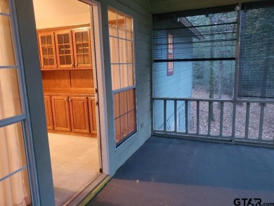 Beautiful chalet style home with Personality plus nestled on two on Holly Lake Ranch Golf Club in Texas - for sale on GolfHomes.com, golf home, golf lot