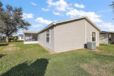 This charming TURNKEY 2/2 Colony Patio Villa is nestled on a on The Links of Spruce Creek in Florida - for sale on GolfHomes.com, golf home, golf lot