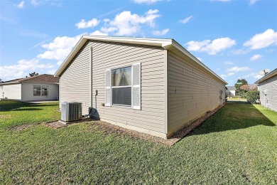 This charming TURNKEY 2/2 Colony Patio Villa is nestled on a on The Links of Spruce Creek in Florida - for sale on GolfHomes.com, golf home, golf lot