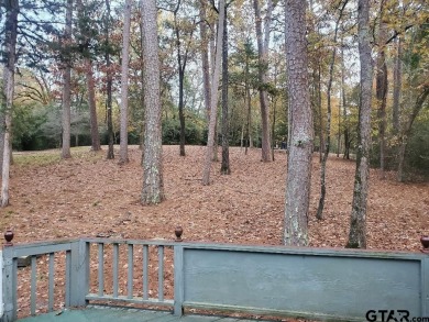 Beautiful chalet style home with Personality plus nestled on two on Holly Lake Ranch Golf Club in Texas - for sale on GolfHomes.com, golf home, golf lot