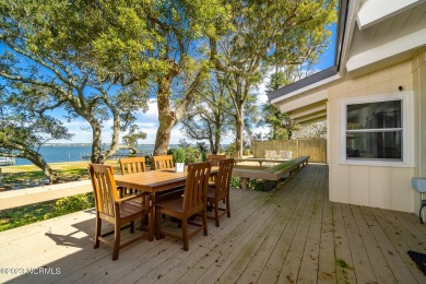This stunning soundfront home in Pine Knoll Shores has been on The Country Club of the Crystal Coast in North Carolina - for sale on GolfHomes.com, golf home, golf lot