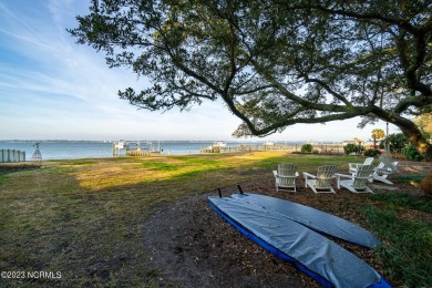 This stunning soundfront home in Pine Knoll Shores has been on The Country Club of the Crystal Coast in North Carolina - for sale on GolfHomes.com, golf home, golf lot