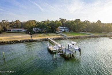 This stunning soundfront home in Pine Knoll Shores has been on The Country Club of the Crystal Coast in North Carolina - for sale on GolfHomes.com, golf home, golf lot