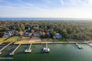 This stunning soundfront home in Pine Knoll Shores has been on The Country Club of the Crystal Coast in North Carolina - for sale on GolfHomes.com, golf home, golf lot