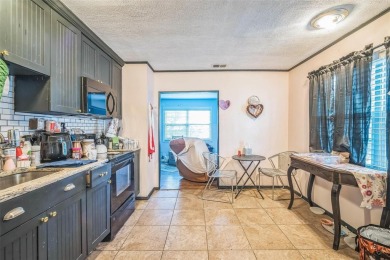 This charming 2-bedroom, 1-bath home has 1,088 sq ft of cozy and on Babe Zaharias Golf Course in Florida - for sale on GolfHomes.com, golf home, golf lot
