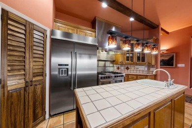 Welcome to this stunning Mediterranean-inspired retreat located on Hackberry Creek Country Club in Texas - for sale on GolfHomes.com, golf home, golf lot