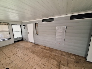 Perfect for seasonal home or rental opportunity! This spacious on Barefoot Bay Golf Course in Florida - for sale on GolfHomes.com, golf home, golf lot