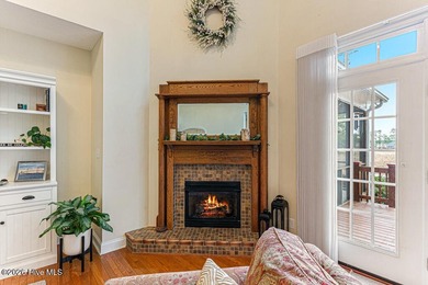 Stunning waterfront brick home located in the gated community of on Woodlake Country Club in North Carolina - for sale on GolfHomes.com, golf home, golf lot