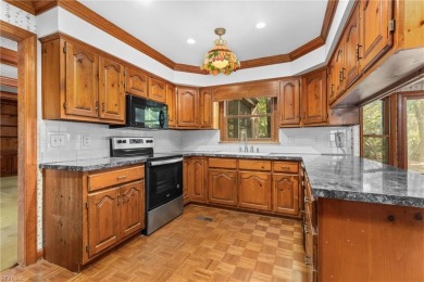 A rehab loan, your decorating ideas and some TLC is all that is on Chesapeake Golf Club in Virginia - for sale on GolfHomes.com, golf home, golf lot