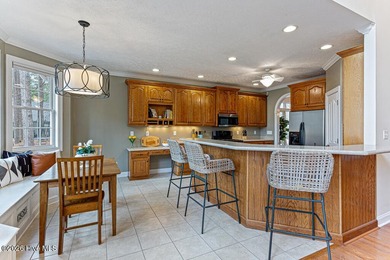 Stunning waterfront brick home located in the gated community of on Woodlake Country Club in North Carolina - for sale on GolfHomes.com, golf home, golf lot