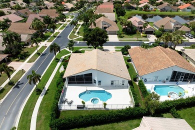 This stunning residence features 3 spacious bedrooms and 3 full on Westchester Golf and Country Club in Florida - for sale on GolfHomes.com, golf home, golf lot