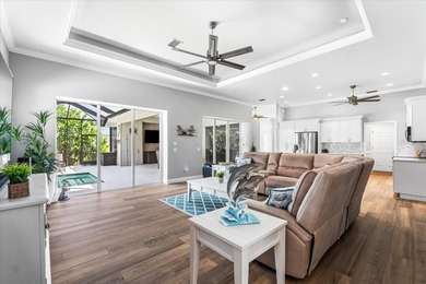 Better than new waterfront pool home in Burnt Store Lakes! This on Burnt Store Golf Club in Florida - for sale on GolfHomes.com, golf home, golf lot