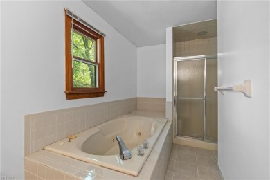 A rehab loan, your decorating ideas and some TLC is all that is on Chesapeake Golf Club in Virginia - for sale on GolfHomes.com, golf home, golf lot