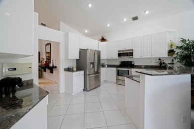 This stunning residence features 3 spacious bedrooms and 3 full on Westchester Golf and Country Club in Florida - for sale on GolfHomes.com, golf home, golf lot